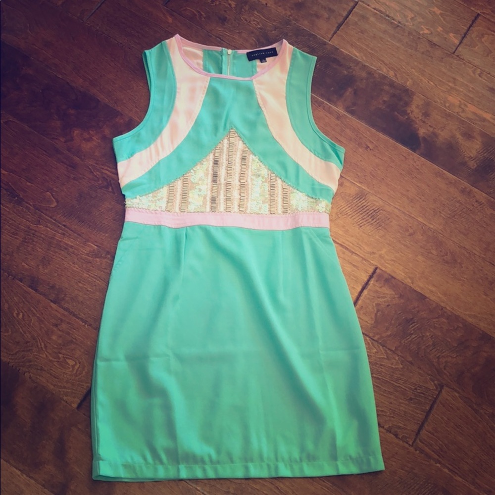 Women’s short and fitted Teal dress NWOT